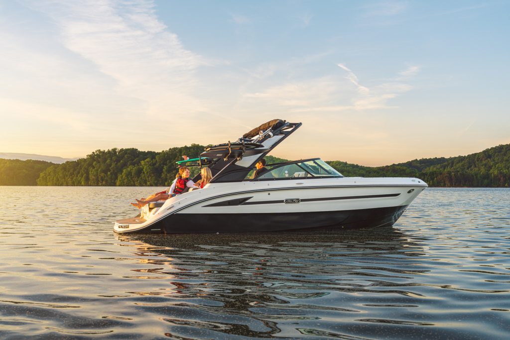 Family aboard an SDX 230 Surf