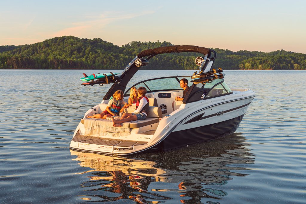 Family aboard an SDX 230 Surf