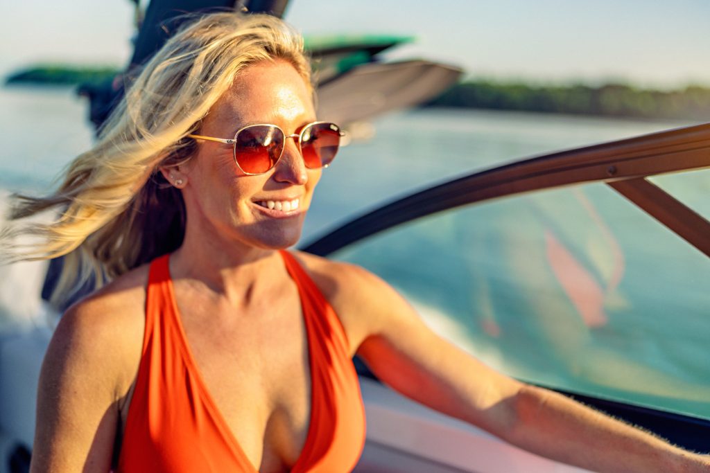 Woman aboard an SDX 230 Surf