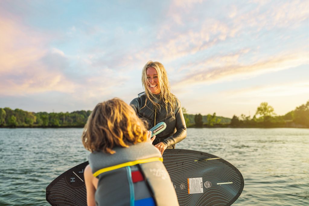 Mother and son with wakesurf board