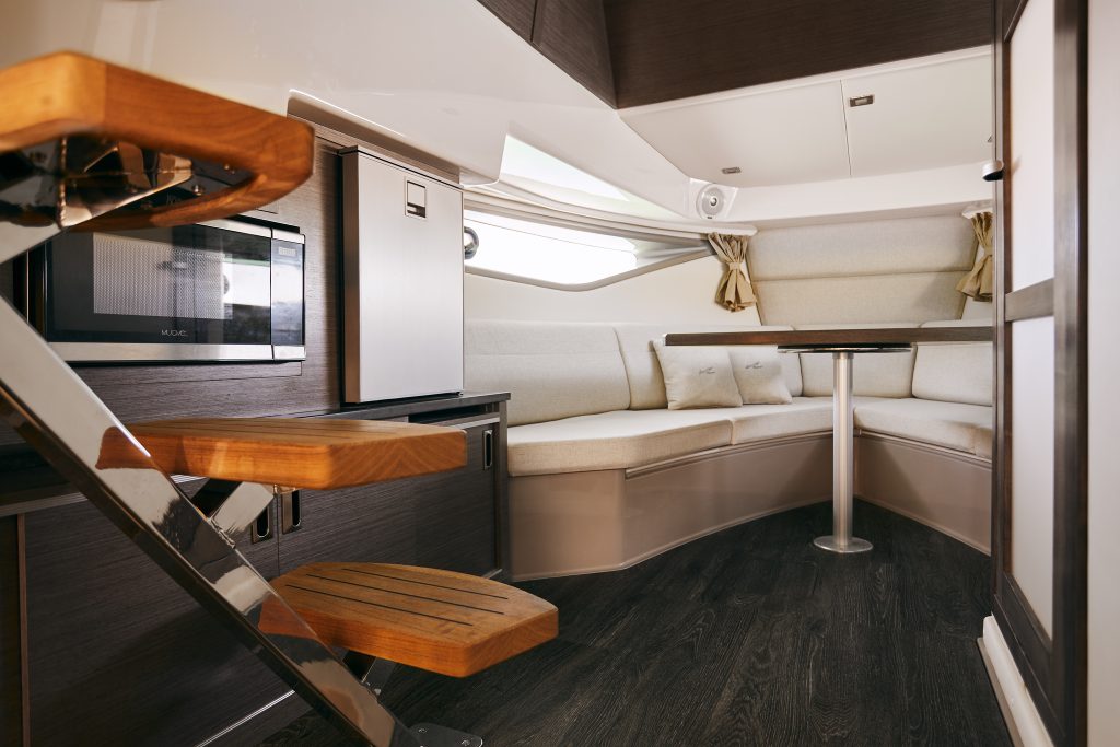 Sundancer 320 day galley and salon with table