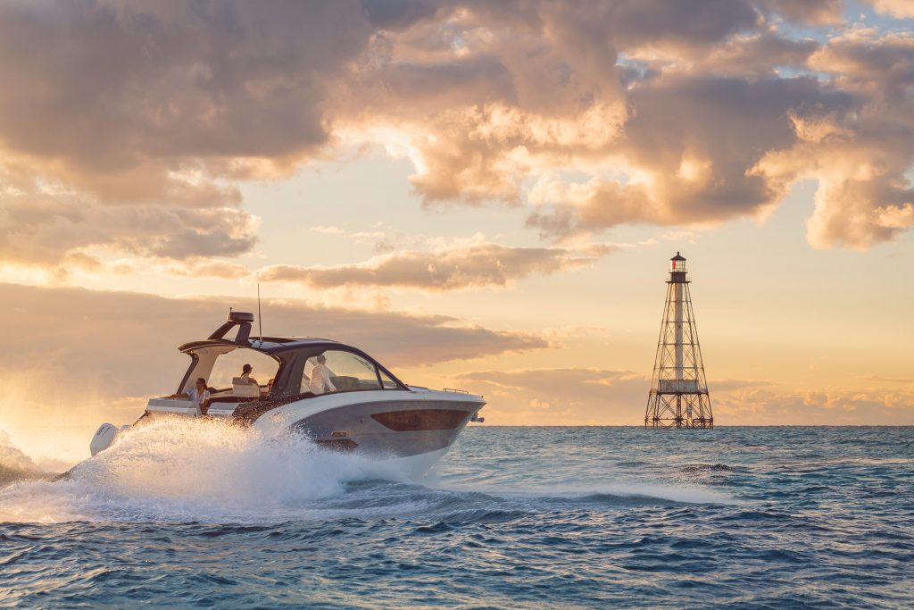 Sundancer 370 Outboard with a lighthouse in the background